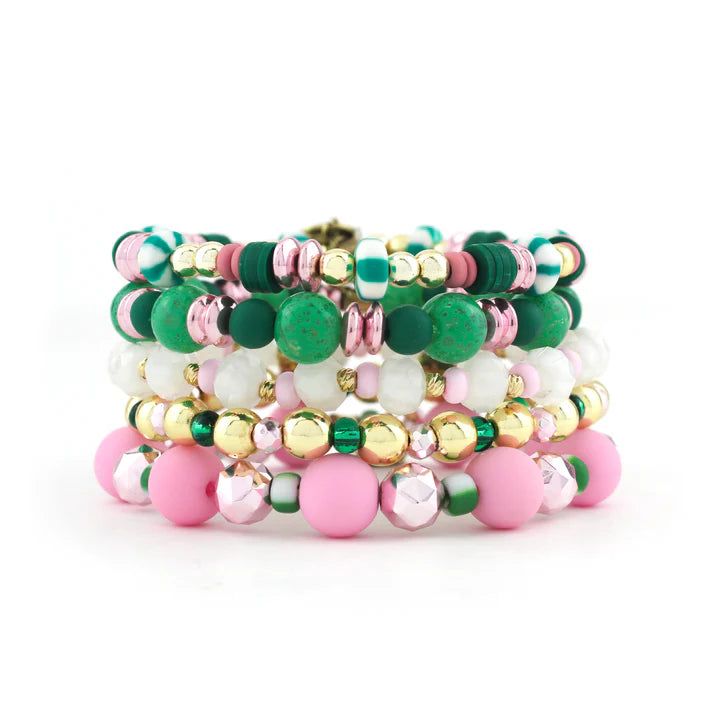 Indulge in some fruity fun with this Watermelon Stack! Drenched in juicy pink and green beads, this bracelet is the ultimate warm weather must-have. Add a playful and quirky touch to any ensemble with this charming accessory. Choose to purchase the full stack or an individual bracelet. 1 bracelet for $9 or 5 for $38 - Discount Applied at Checkout Lead & Nickel Free Bracelets are 'one size fits most' and are designed to fit wrists up to 7.5" comfortably. Please be aware that due to the unique and Green Stretch Bracelet With Colorful Beads, Adjustable Green Charm Bracelet For Party, Green Round Beads Bracelets For Party, Green Stretch Bangle Bracelet With Colorful Beads, Green Bangle Bracelets With Colorful Beads, Green Stretch Bangle With Colorful Beads, Green Bangle Bracelet With Colorful Beads, Playful Green Beaded Bracelet As A Gift, Whimsical Pink Bracelets With Colorful Beads