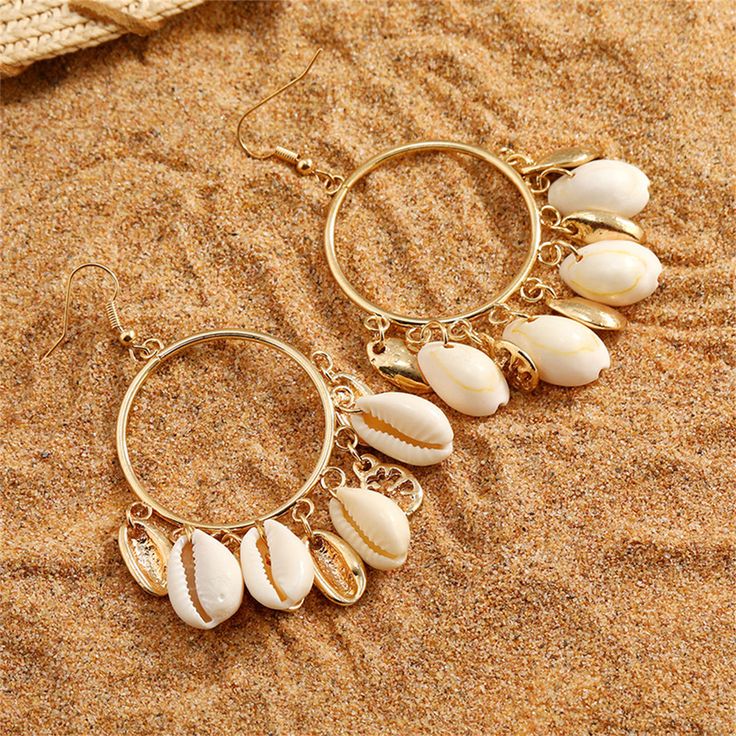 Boho drop earrings featuring 18k gold-plated hoops with shell tassel beads. 1.96" W x 3.07" L 18k gold-plated copper / shell Conch Earrings, Boho Drop Earrings, Conch Earring, Life Series, Tassel Drop Earrings, Stylish Earring, Conch Shell, Shell Earrings, Beaded Tassels