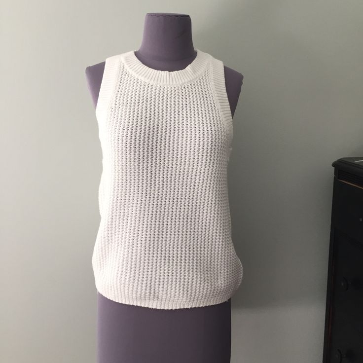 Summer Knit Sleeveless Sweater From Anthropologie. New With Tags, Never Worn. 100% Cotton. Machine Wash Cold, Tumble Dry Length 23” Across Chest 16.5 Inches *** I Bought Two Sizes And Have Worn The Other Size All Summer. It’s A Great Top To Wear With Jeans Or Flowy Linen Pants. Also Perfect Under A Blazer. Open Knit Layering Tank Top, Stretch Pointelle Knit Tank Top For Layering, White Pointelle Knit Stretch Tank Top, White Pointelle Knit Tank Top For Spring, Crew Neck Pointelle Knit Tank Top, White Stretch Pointelle Knit Tank Top, Textured Knit Cotton Tank Top For Layering, Cotton Textured Knit Tank Top For Layering, Chic Sleeveless Textured Knit Sweater