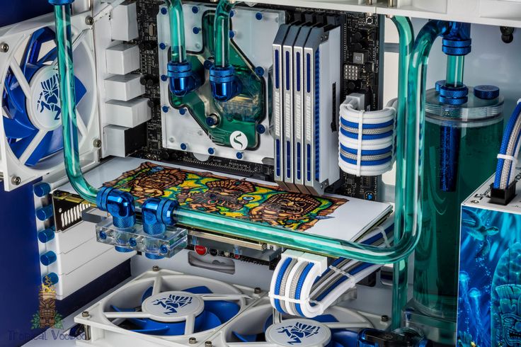 the inside of a computer case with blue and white accessories on it's sides