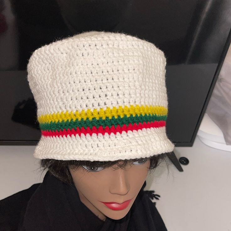 Handmade Crotchet Hat. Acrylic. Stretchy. White W/(Red Green Gold). Unisex. New. Adult Fit. One Size Fits Most. Yellow (Gold). Black Hat Sold Separately. White Cotton Beanie Hat, Fitted White Crochet Hat Casual, White Cotton Bucket Hat One Size, White Cotton Vacation Hat, Adjustable White Crochet Bucket Hat, White Adjustable Crochet Bucket Hat, Trendy White Crochet Hat, One Size Fits Most, Trendy White Crochet Hat One Size Fits Most, Trendy White Crochet Hat