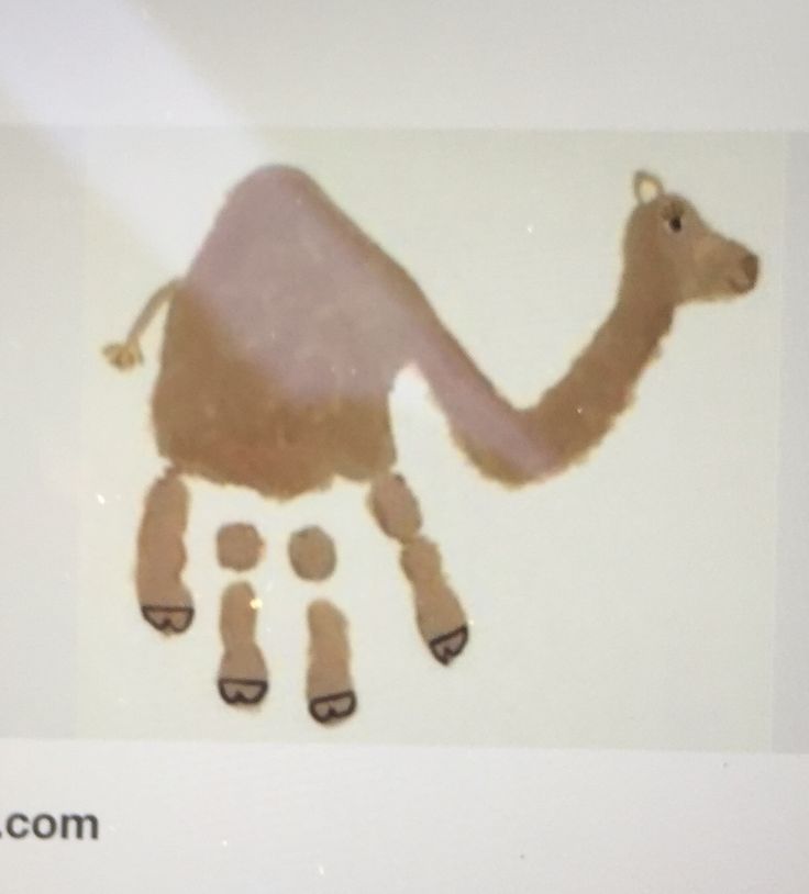 an image of a camel made out of baby's handprints on a white background