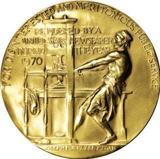 a gold medal with an image of a man on it