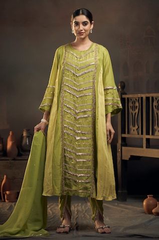 Green and lime green paneled kurta with gota embroidery. Comes with coordinating dhoti pant and dupatta. - Aza Fashions Green Slub Silk Salwar Kameez With Cutdana, Designer Wear Green Slub Silk Churidar, Green Cotton Silk Churidar With Gota Work, Designer Green Slub Silk Churidar, Unstitched Pista Green Slub Silk Kurta, Designer Pista Green Kurta For Navratri, Pista Green Slub Silk Sets With Dupatta, Green Slub Silk Kurta With Dabka Work, Bollywood Green Slub Silk Sets