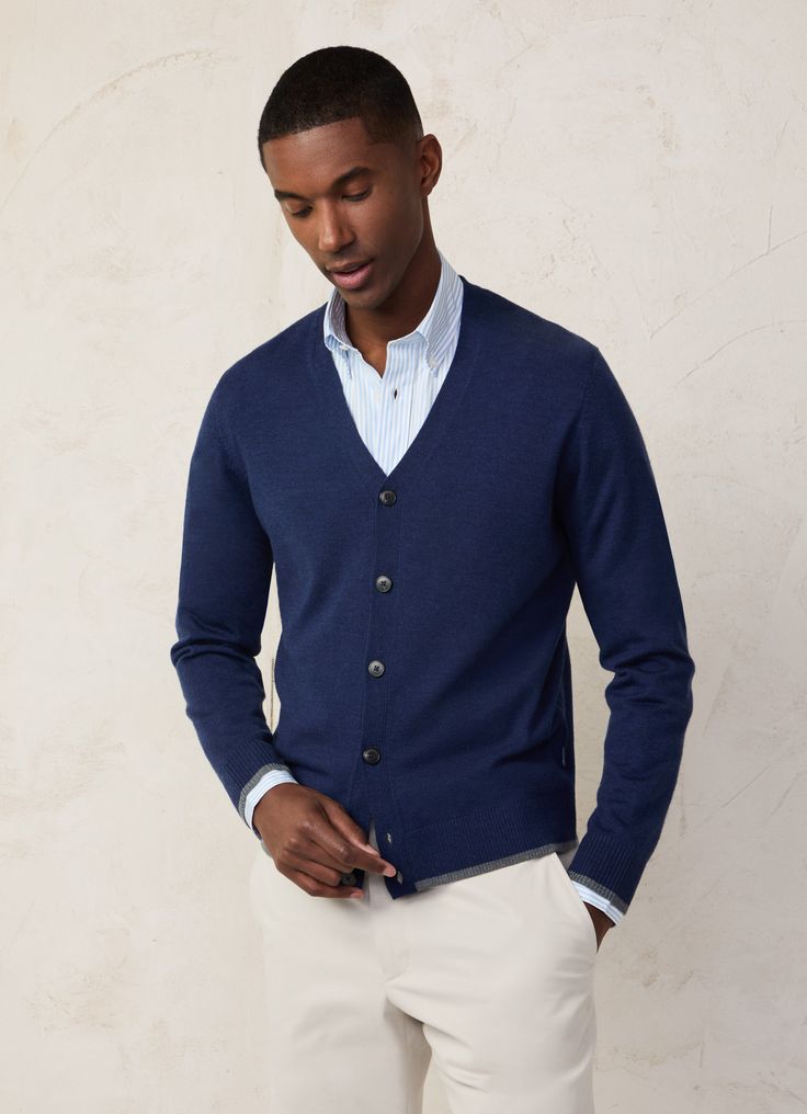 - Cardigan in 100% cashmere fabric. - V-neck. - Button fastening on the front. - Ribbed detail with trimming on neck, cuffs, and hem. - FAÇONNABLE logo label on side seam. - Oversized buttons with engraved logo. Classic Button-up Cashmere Sweater, Classic V-neck Fine Knit Cardigan, Wool V-neck Cardigan For Layering, Elegant Merino Wool V-neck Outerwear, Formal Merino Wool Sweater With Ribbed Cuffs, Wool V-neck Sweater With Buttons, Elegant Wool Sweater With Buttons, Classic Winter Cardigan For Business, Formal Wool Sweater With Ribbed Cuffs