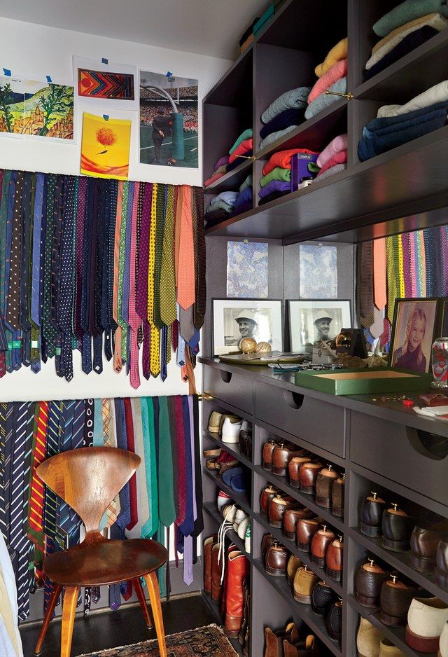 a room filled with lots of different types of scarves and shoes on shelves next to each other