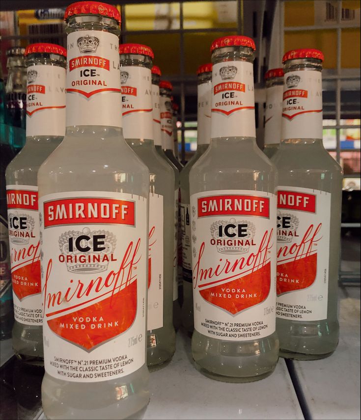 several bottles of ice imperial on display in a store