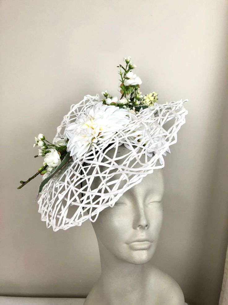 "Kentucky Derby- Horse Race-Flower Garden Fascinator- Ladies Luncheon hat- Flower Headband- Wedding - Day at the Races- Polo Match Hello,     Perfect for a tea party, wedding, ladies' lunch, bridal or baby tea party or a day at the races!    Off white flowers match many outfits! This fascinator has a about 14\" diameter.... flowers are placed on along the center.  Two large white dahlias (6\")  and assorted spring blossoms And greenery . It's on a skinny 1/8' matching satin covered headband that Elegant Flower Headpieces For Spring, Adjustable Mini Hats For Spring Ceremonies, Spring Flower Fascinator For Formal Occasions, Spring Formal Fascinator With Handmade Flowers, White Short Brim Fascinator For Spring, Spring White Fascinator With Short Brim, Spring Formal Flower Fascinator, Floral Headpieces For Summer Garden Parties, Formal Spring Headpiece With Handmade Flowers