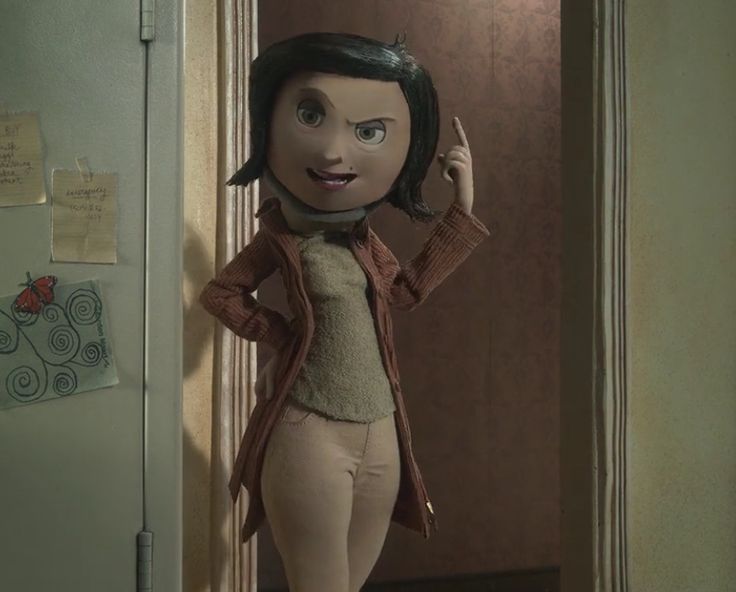 an animated doll is standing in the doorway