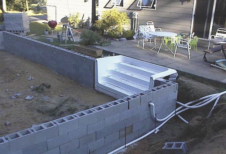 the back yard is being built and ready to be used as an outdoor space for entertaining