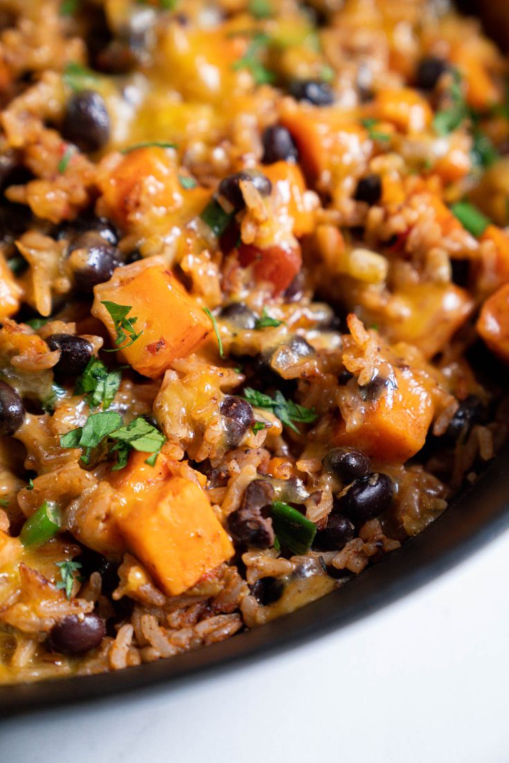 a bowl filled with rice and black beans