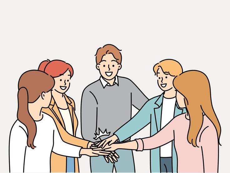 a group of people standing around each other with their hands on top of each other