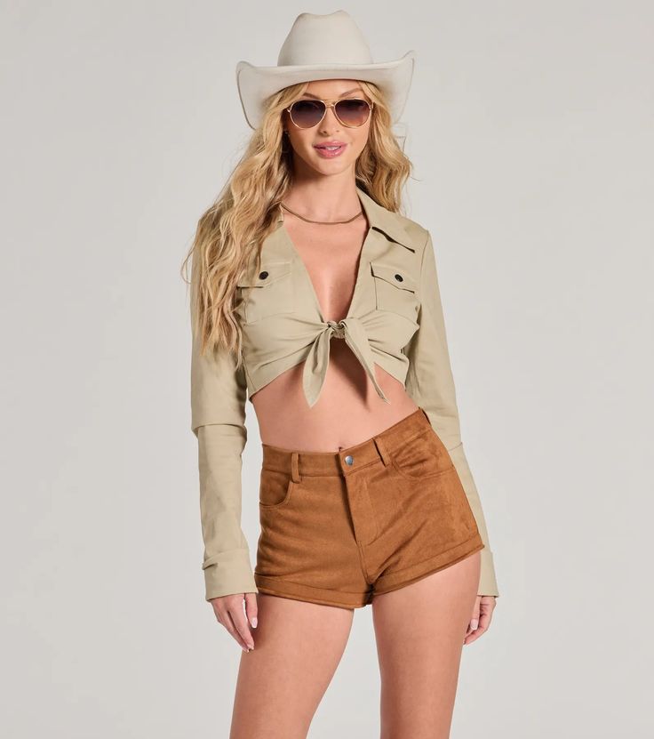 Serve adventurous girlie vibes this Halloween in this woven crop top! It features a collared V-neckline, a tie-front design, long sleeves with cuffed hems, and buttoned chest pockets. Complete your costume with the faux suede shorts, cowgirl hat, aviator sunglasses, and boots!Fit & FeaturesBrushed woven fabric, no stretchCollared V-necklineTie-front designLong sleeves with cuffed hemsChest pockets with snap button detailFitted cropped hemRuns true to size Spring Chic Collared Crop Top, Chic Collared Crop Top For Spring, Fall Day Out Crop Top, Chic Spring Collared Crop Top, Fall Crop Top For Day Out, Cropped Shirt For Fall Day Out, Fitted Collared Crop Top For Spring, Trendy Collared Crop Top For Summer, Chic Fall Cropped Shirt For Day Out