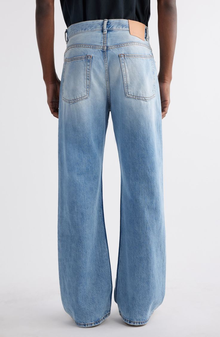 Acne Studio's gives classic bootcut jeans—cut from faded and distressed light-wash nonstretch organic-cotton denim—a modern update with a looser fit. 21" leg opening; 12 1/2" front rise; 16" back rise Zip fly with button closure Five-pocket style 100% cotton Dry clean Made in Italy New Concepts @Nordstrom Faded Relaxed Fit Flare Jeans With Five Pockets, Faded Flare Jeans With Straight Hem, Faded Denim Flare Jeans With Straight Hem, Loose Bootcut Jeans, Bootcut Jeans, Loose Fitting, Organic Cotton, Light Blue, Dry Clean