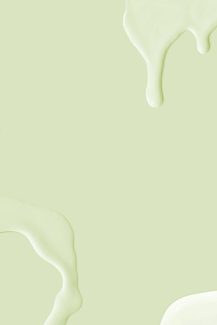 green and white paint swirls in the air on a light green wallpaper background