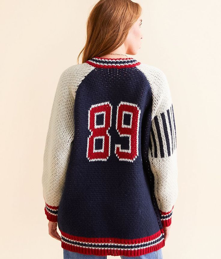 DH Apparel Varsity Cardigan Sweater - Blue Medium, Women's Rednavycream Zip down cardigan sweater Bust measures 44 on size small Body length 27 on size small. Layering piece(s) and/or accessories sold separately.. 100% Polyester. Hand wash cold separately. Do not bleach. Lay flat to dry. Low iron if needed. Apparel & Accessories > Clothing > Shirts & Tops Varsity Style Long Sleeve Sweater For Fall, Sporty Knit Outerwear For Fall, Navy Winter Sweater For College, Navy Winter College Sweater, Winter Varsity Cardigan, Varsity Style Winter Cardigan For College, Varsity Style Cardigan For College In Winter, Varsity Cardigan For Winter College Season, Varsity Sweater For College In Fall