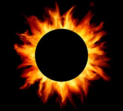 the sun is in the middle of a black sky with red and yellow flames around it