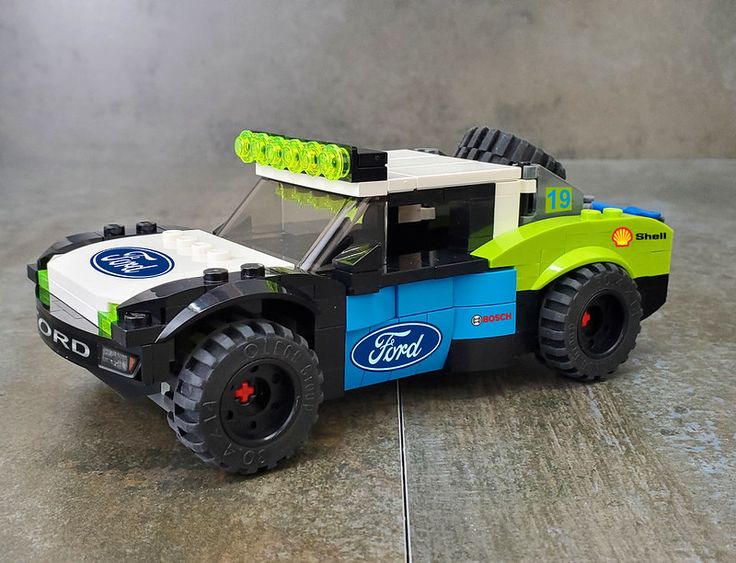 a toy truck made out of lego blocks