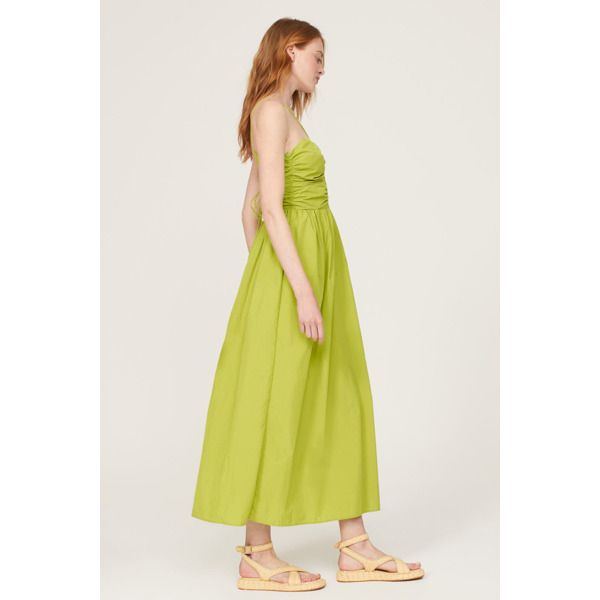 Green poplin (100% Nylon). A-line. Sleeveless. Halter neck. Tie closure. 48" from shoulder to hemline. Imported. Spring A-line Maxi Dress With Smocked Back, Spring A-line Ruched Sundress, Spring A-line Midi Dress With Smocked Bodice, Green Sleeveless Midi Dress With Fitted Bodice, Green Fitted Sleeveless Midi Dress, Summer A-line Maxi Dress With Gathered Neckline, Sleeveless Cotton Midi Dress With Ruched Bodice, Spring Cotton Dress With Gathered Neckline, Green Midi Dress With Gathered Neckline For Summer