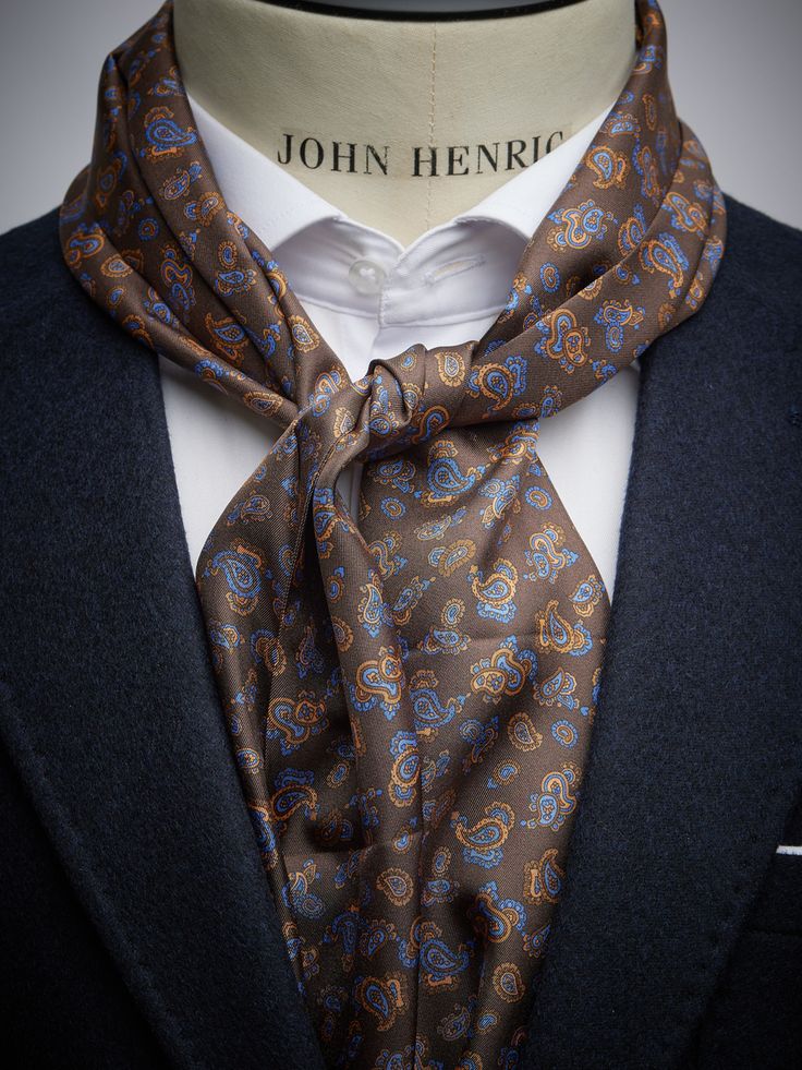 Men’s silk scarves – Brown silk scarf.
This brown silk scarf in a paisley print is a perfect relaxed but stylish alternative to the tie. The silk scarf is the perfect choice if you want to add an extra dimension to your look. Our silk scarves for men is sewn and manufactured with great care with tradition and genuine craftmanship. Scarves For Men, Brown Silk, Scarf Men, Suit Fashion, Silk Scarves, Paisley Print, Silk Scarf, Paisley, Lost