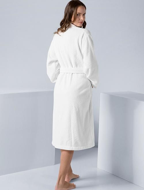 Getting home after a long day of work and tossing on a comfy robe is the best feeling. This Turkish cotton terry bathrobe for women was clearly made with those evenings in mind. It is made from high-quality cotton material that is both soft and cozy to keep you warm at all times. Featuring a tie belt, shawl collar, and pockets, this robe combines style and comfort to bring you a truly satisfying experience. Its versatility as a bathrobe makes it the perfect clothing accessory to wear anytime, an Relaxed Fit Solid Color Robe For Relaxation, Long Sleeve Comfortable Robe For Relaxation, Comfortable Long Sleeve Robe For Relaxation, Comfortable Long Sleeve Relaxation Robe, Cozy Relaxed Fit Robe For Lounging, Relaxed Fit Robe For Lounging, Relaxed Fit Solid Color Lounging Robe, White Long Sleeve Robe For Loungewear, Cozy White Robe For Relaxation