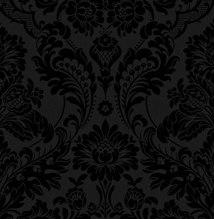 a black and grey wallpaper with an ornate design