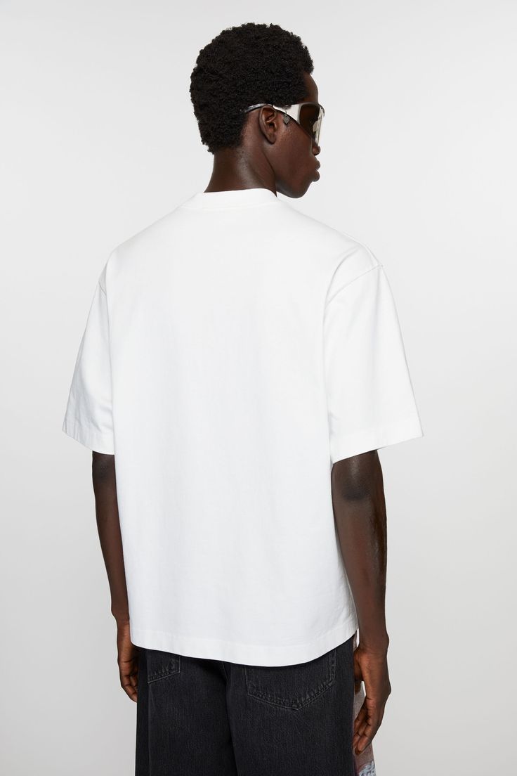 T-shirt is crafted from midweight jersey cotton and detailed with an Acne Studios logo on the centre front. Cut to a relaxed fit. Crew Neck T-shirt With Embroidered Logo For Streetwear, Boxy Fit Organic Cotton T-shirt With Crew Neck, Modern Short Sleeve T-shirt With Branding, Casual Cotton T-shirt With Logo, Modern Cotton T-shirt With Branding, Relaxed Fit T-shirt With Logo And Short Sleeves, Logo Detail Short Sleeve T-shirt For Streetwear, White T-shirt With Logo Detail And Relaxed Fit, White T-shirt With Logo Detail