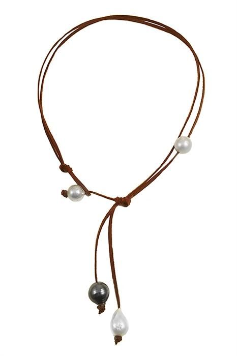 Gwyneth Paltrow makes the Tahitian & South Sea Lariat the fashionable focal point of her casual look, proving celebrity jewelry can be easy to wear. This genuine leather piece makes Boho style a breeze. Elegant Lariat Necklace With Adjustable Cord, Elegant Leather Necklace With Adjustable Cord, Elegant Leather Lariat Jewelry, Elegant Adjustable Leather Necklaces, Elegant Adjustable Lariat Necklace With Sliding Knot, Elegant Brown Lariat Jewelry, Chic Adjustable Leather Necklace, White Pearl Jewelry, Pearl Lariat