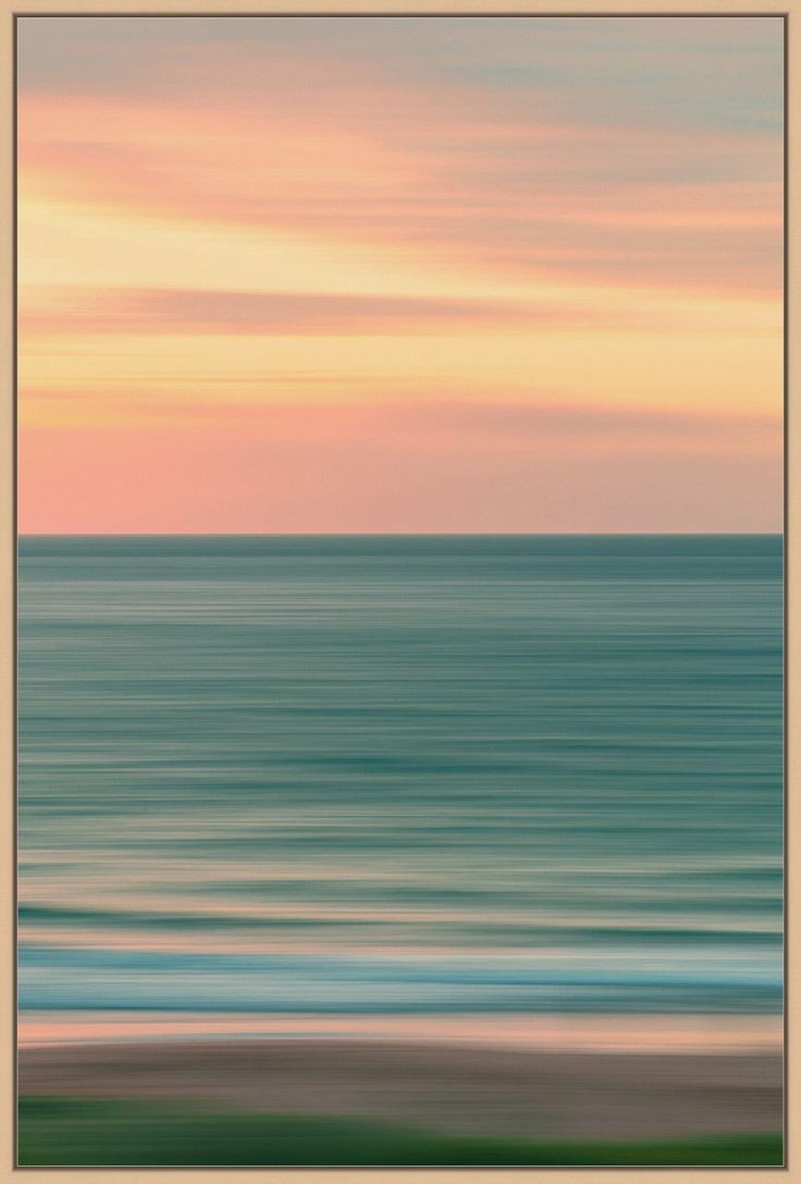 an abstract photo of the ocean at sunset