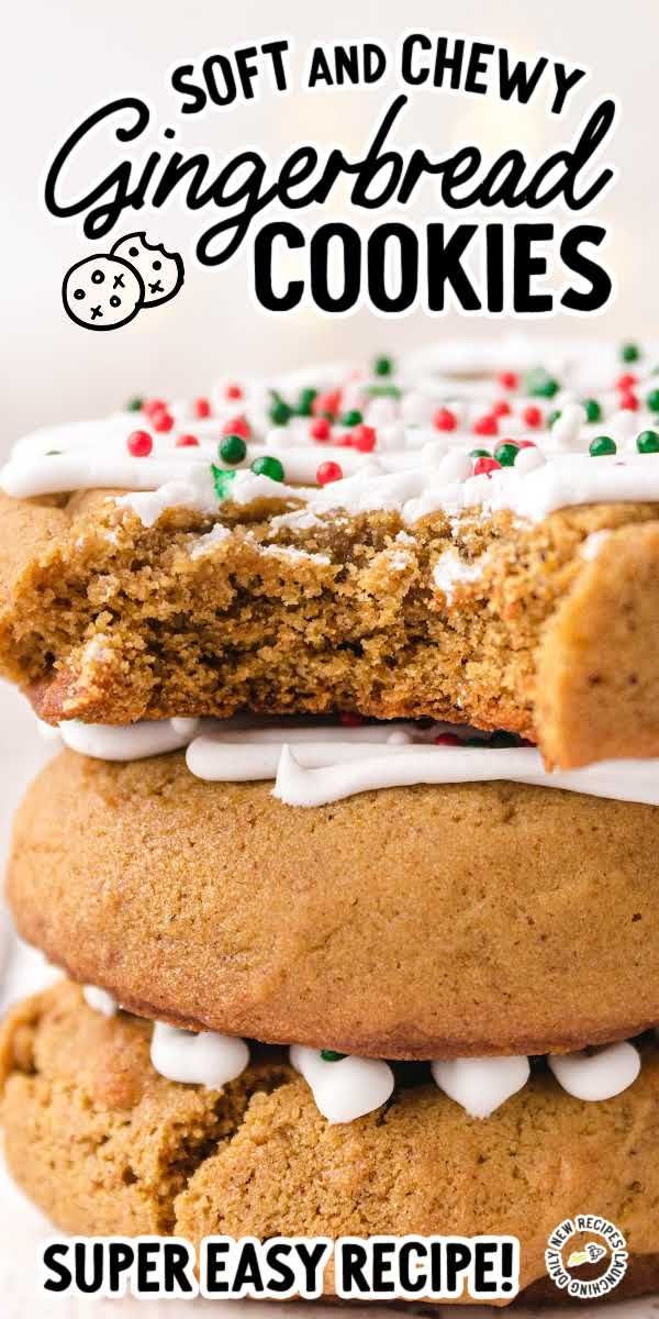 three cookies stacked on top of each other with white frosting and sprinkles