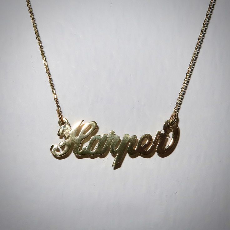 Our classic nameplate is now available in 10k Solid Gold! All items included in our Solid Gold Collection includes complimentary gift wrapping. ITEM SPECIFICSMetal type: 10k Yellow Gold Pendant size: Approximately 1 in. ~ 1.25 in. long; 1.1g (7 Letters)Chain length (including pendant) weight: 16 in. (1.0g), 18 in. (1.1g), 20 in. (1.2g), 22 in. (1.3g), 24 in. (1.4g)The size and weight are approximate. Please allow up to +/- 10% differenceProcessing time: 7-9 business days Made in the United State United State, Yellow Gold Pendants, Gold Collection, Name Plate, Chain Lengths, Chain Length, Gold Pendant, Solid Gold, Chain Necklace