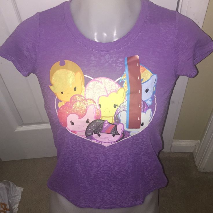 Size L | 10/12 Nwt Cute Crew Neck Shirt For Playtime, Casual Tops With Cartoon Print For Playtime, Casual Tops With Character Print For Playtime, Cute Graphic Print Tops For Playtime, Cute Multicolor Shirt With Character Print, Cute Multicolor T-shirt For Playwear, Cute Purple Top With Graphic Print, Cute Multicolor Shirt For Playtime, Casual Purple Top For Playtime