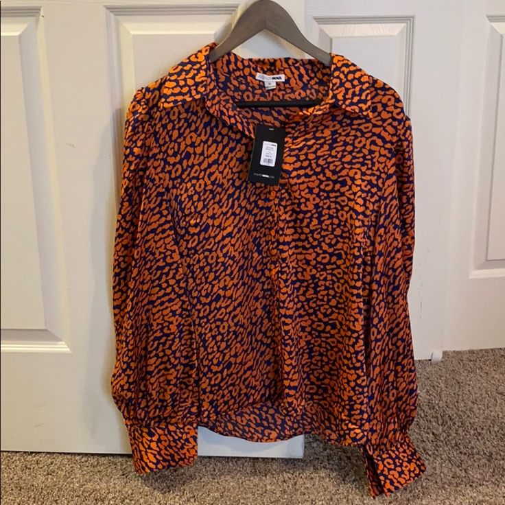 Brand New Xl Fashion Nova Navy And Bright Orange Button Up Blouse! So Cute Just Too Big For Me. Orange Button-up Blouse For Fall, Orange Collared Blouse For Fall, Fall Orange Blouse With Button Closure, Orange Long Sleeve Blouse For Work, Orange Fall Workwear Shirt, Orange Fall Workwear Tops, Orange Tops For Workwear In Fall, Orange Tops For Fall Workwear, Orange Workwear Tops For Fall