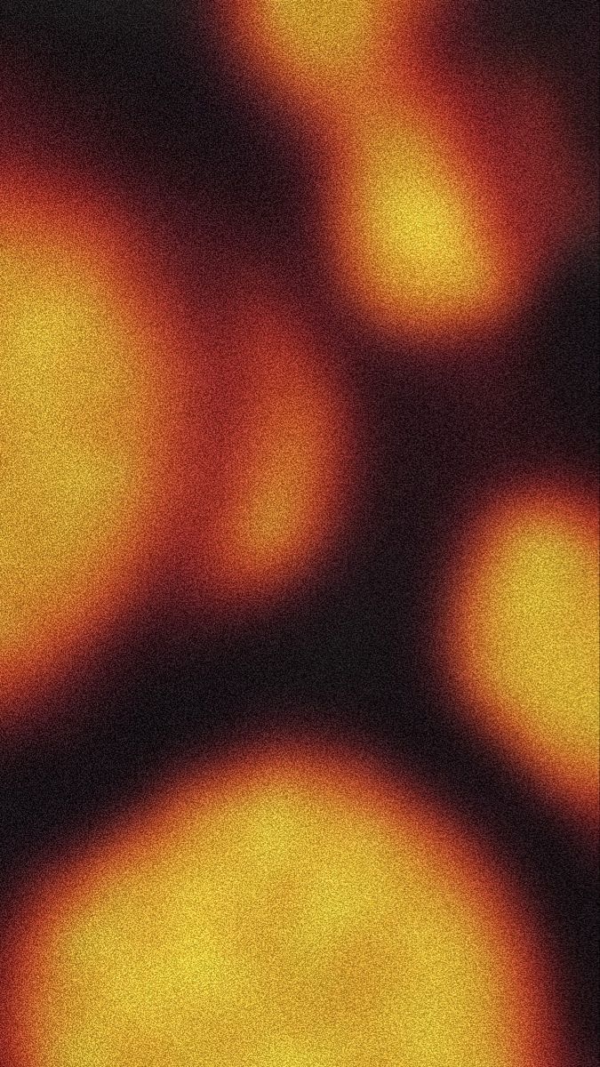 an orange and black background with circles