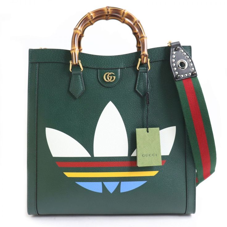 Gucci X Adidas Diana Large Tote Bag Dark Green Height: About 38 Cm Width: About 37 Cm Depth: About 15 Cm Designer Green Handheld Bag, Designer Green Shoulder Bag For Shopping, Designer Logo Rectangular Shoulder Bag, High-end Top Handle Bag With Logo, Designer Green Shoulder Bag With Handles, Designer Tote Bag With Logo, Designer Logo Rectangular Shopping Bag, Rectangular Designer Logo Bag, Designer Rectangular Bag With Logo