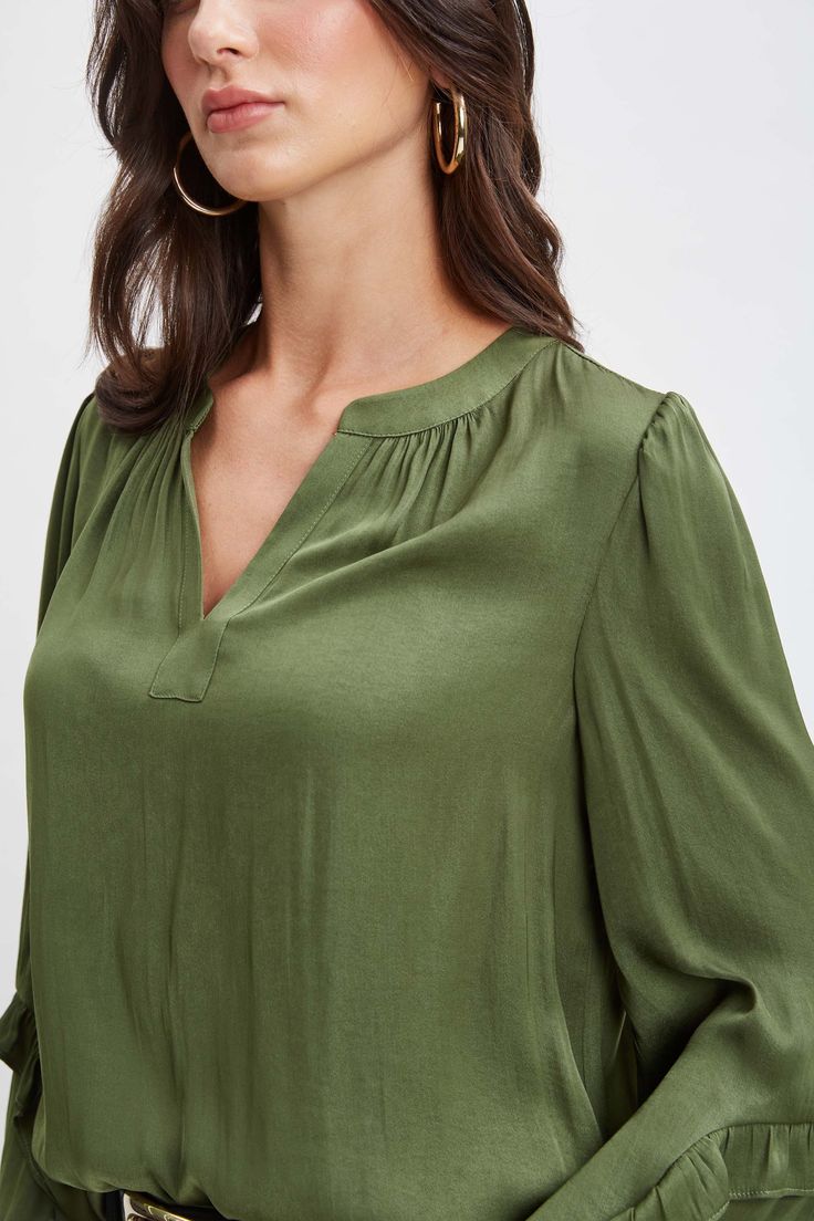 It's all in the details. Romantic & feminine, our long sleeve shirt features a split tie neckline & pleated bodice detailing. With its long blouson sleeves & effortless fit, this style is a year-round essential. T-Tahari Long sleeve Airflow Blouse with Pleat Detailing & Blouson Sleeves Runs true to size Model is 5'9" and wearing size S Dry Clean Only Imported Style #: THF48008 Autumn Green, Jumpsuit Jacket, Pleated Bodice, Long Sleeve Short Dress, Knit Tees, Denim Coat, Knit Jacket, Cardigan Jacket, Skirts For Sale