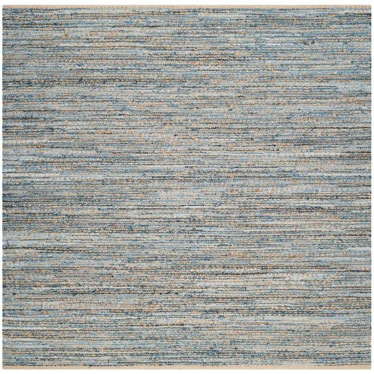 an area rug with blue and grey stripes