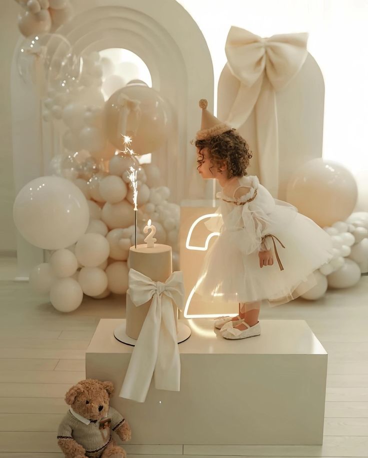 2 year old baby birthday party styling, white simple bow decoration🎂 #babybirthdayparty #2ndbirthday #2ndbirthdayparty #2ndbirthdaycake #babybirthdayideas #babybirthdaydeco #babybirthdayphotography #babybirthdayphotoshoot #birthdaydecoration #birthdayballoons Birthday Idea 1 Year, Two Year Party Theme, One Year Old Birthday Party Decorations, 1st Birthday Crib Pictures, White Decoration Birthday, All White First Birthday Party, 1 Year Party Ideas, Birthday Bow Theme, Birthday 2 Year Girl