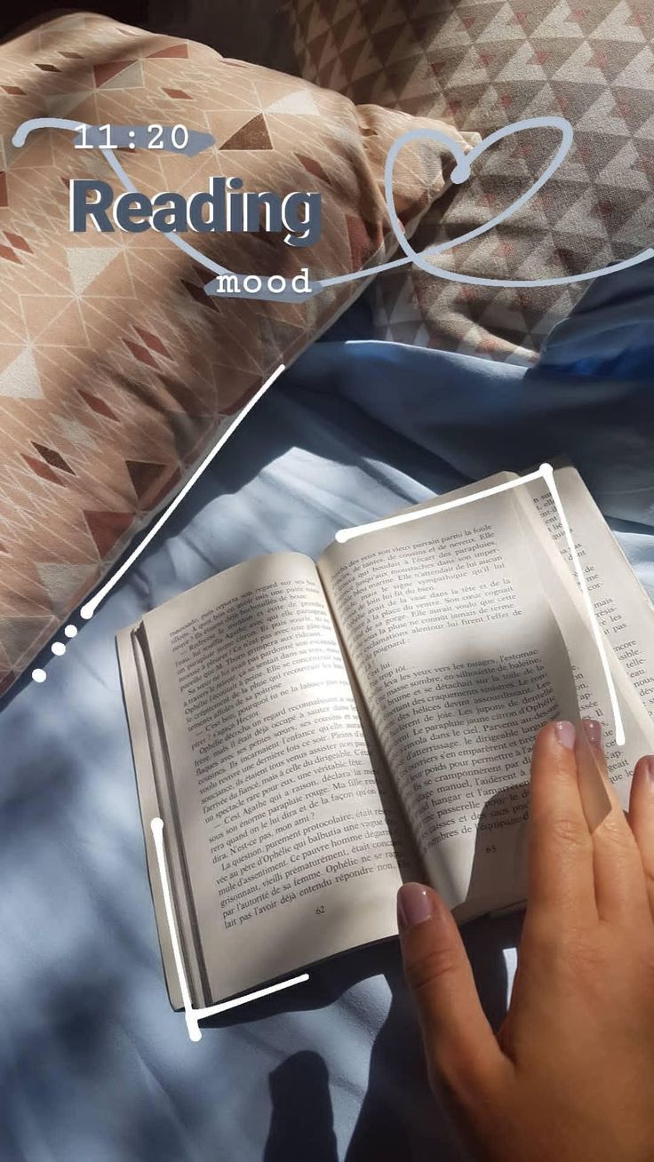 someone is reading a book in bed with the words reading mood above them and below it