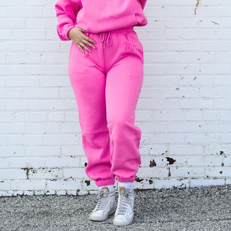 Experience the perfect balance of comfort and style with our Pink Sweatpants, available in sizes S to 5XL. Designed for a relaxed yet flattering fit, these sweatpants are ideal for lounging, running errands, or casual everyday wear. Ultimate Comfort: Crafted from a buttery soft, cotton-blend fabric, these sweatpants offer all-day comfort. The relaxed fit ensures freedom of movement, making them your go-to for both relaxation and activity. Features: Equipped with a thick elastic waistband and adj Trendy Sweatpants For Lounging, Baggy Sweats With Elastic Waistband For Leisure, Solid Color Sportswear Sweatpants With Drawstring, Athleisure Joggers With Elastic Cuffs For Leisure, Solid Color Sweatpants For Spring Lounging, Solid Color Drawstring Sweatpants For Loungewear, Solid Color Sweatpants With Elastic Cuffs For Lounging, Loungewear Sweatpants With Elastic Cuffs, Solid Sweatpants With Elastic Waistband For Loungewear