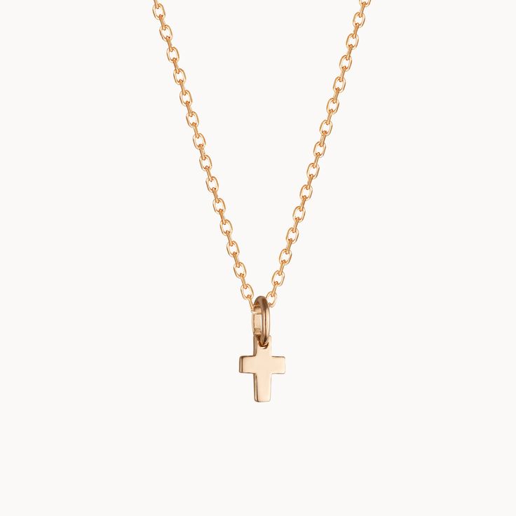 A timeless classic to treasure each day, our Mini Cross Charm Necklace is perfect for commemorating those special moments. Gift to a loved one or cherish your new favorite necklace in either 18K Champagne Gold Plated or 925 Sterling Silver.&nbsp;18K Champagne Gold Plated or 925 Sterling SilverMini Cross: 0.3 x 0.2Charms are removable from this chain and can be worn on all Merci Maman chain lengthsSent with love in a complimentary gift box Cross Charm Necklace, Mini Cross, Box Delivery, Cross Charms, Champagne Gold, Special Moments, Each Day, Timeless Classic, Chain Styles