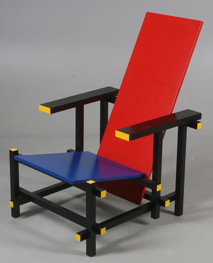 a red and blue chair sitting next to each other