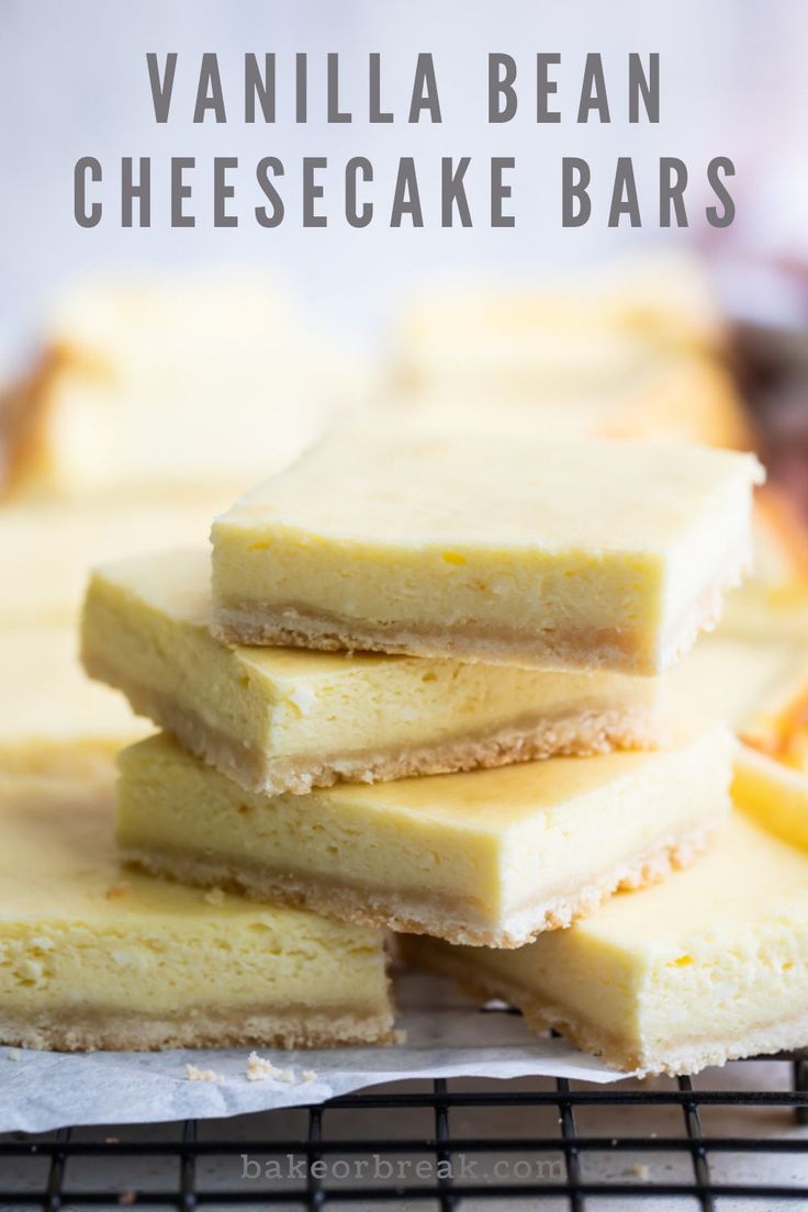 vanilla bean cheesecake bars stacked on top of each other