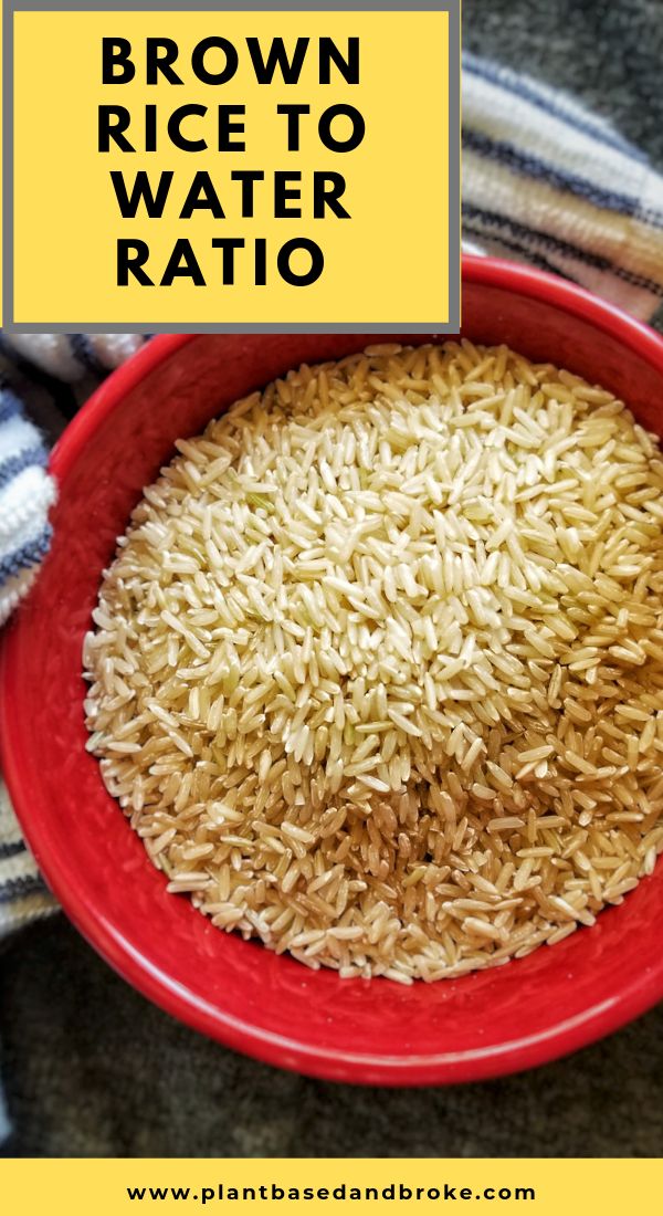 brown rice in a red bowl with the words brown rice to water ratio