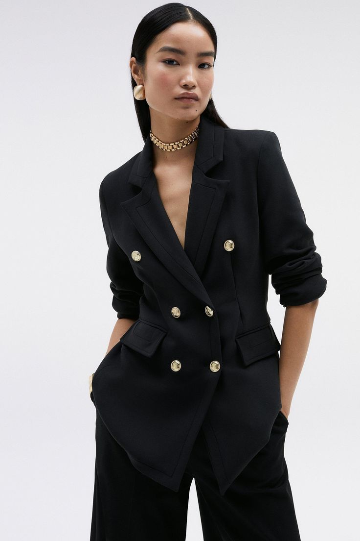 A Sculptural Rendition Of The Classic Blazer, This Piece Offers Endless Sophistication. Sharp Tailoring And Double-Breasted Buttons Create A Cinched Silhouette, While Classic Notched Lapels And Flap Pockets Add A Traditional Touch. Style This Blazer With Two Piece Setinating Tailored Pants For A Powerful Ensemble, Or Size Up For A Contemporary, Oversized Aesthetic.Style: Blazerfabric: Wovenlength: Regularneckline: Collaredsleeve Length: Long Sleeve Luxury Double-breasted Blazer With Double Button, Luxury Double-breasted Blazer With Button Closure, Luxury Blazer Dress With Double Button And Notch Lapel, Elegant Double-breasted Business Casual Suit, Luxury Double-breasted Blazer With Hidden Buttons, Luxury Double-breasted Semi-formal Blazer, Luxury Double-breasted Suit For Office, Formal Double-breasted Blazer With Hidden Buttons, Fitted Double-breasted Structured Blazer