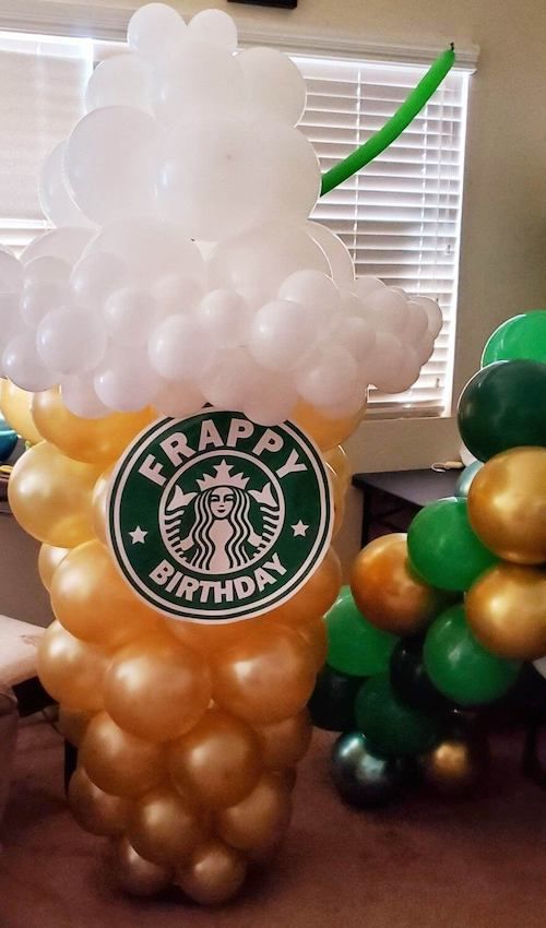 a starbucks birthday balloon in the shape of a bunch of balloons