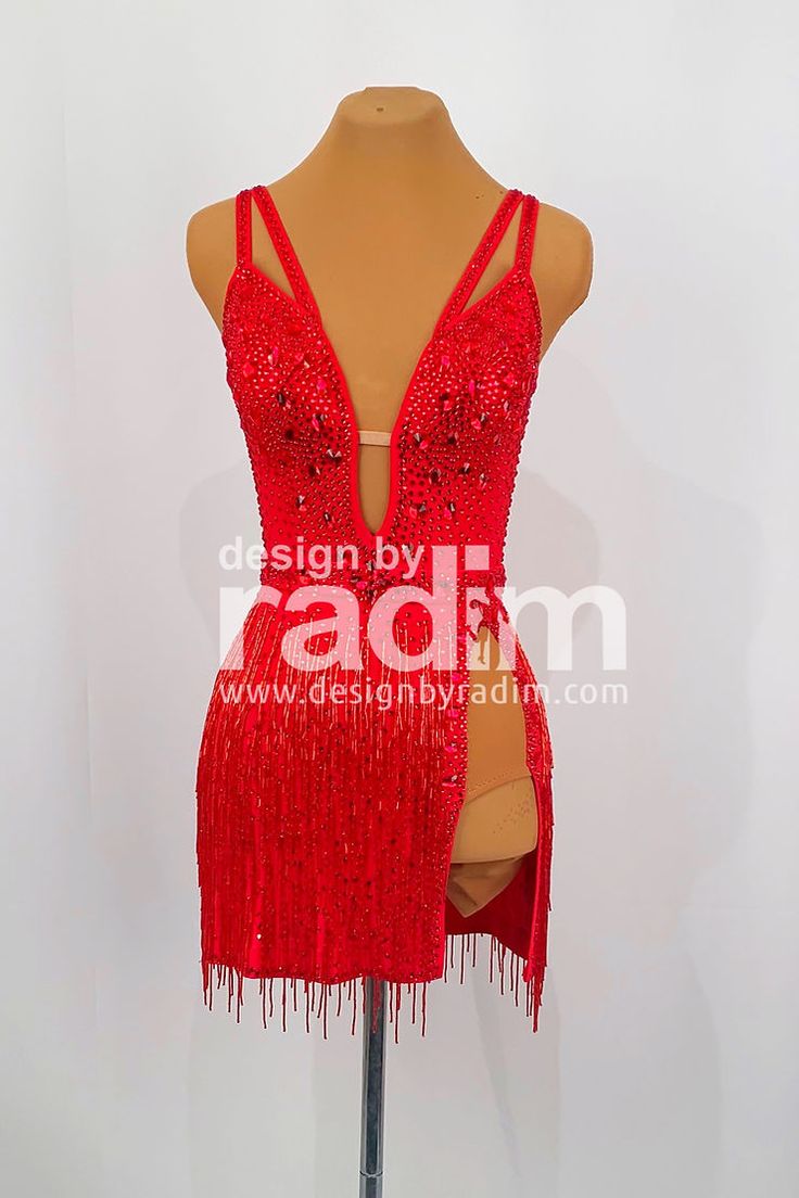 a mannequin with red sequins on it's torso and back