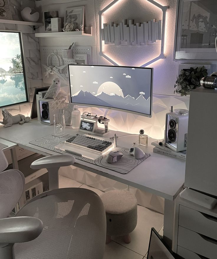 a computer desk with two monitors on it