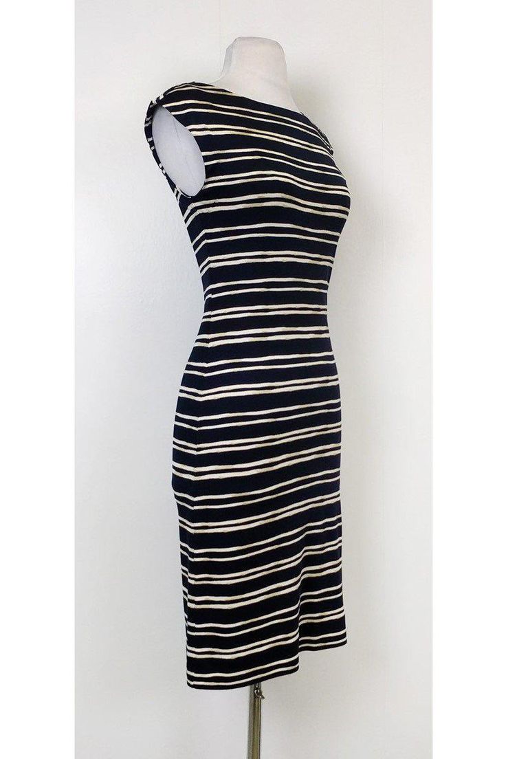 Make a statement in bold stripes! This nautical inspired dress is lightweight and stylish. Pair it with a red lip and chic wedges for a day time ready ensemble. Size XS 100% silk Boat neck Slips on Striped pattern Sleeveless Fitted Bust 32" Waist 28" Shoulder to hem 38" Fitted Striped Midi Dress For Beach, Fitted Sleeveless Midi Dress With Vertical Stripes, Sleeveless Striped Lined Midi Dress, Striped Sleeveless Lined Midi Dress, Striped Sleeveless Midi Dress, Lined, Fitted Midi Dress With Vertical Stripes For Summer, Summer Midi Dress With Vertical Stripes, Chic Dresses With Horizontal Stripes, Chic Striped Lined Midi Dress