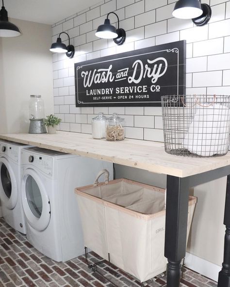 a laundry room with washer and dryer in it